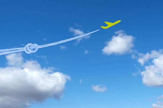 Ein stilisiertes gelbes Flugzeug vor blauem Himmel mit Wolke