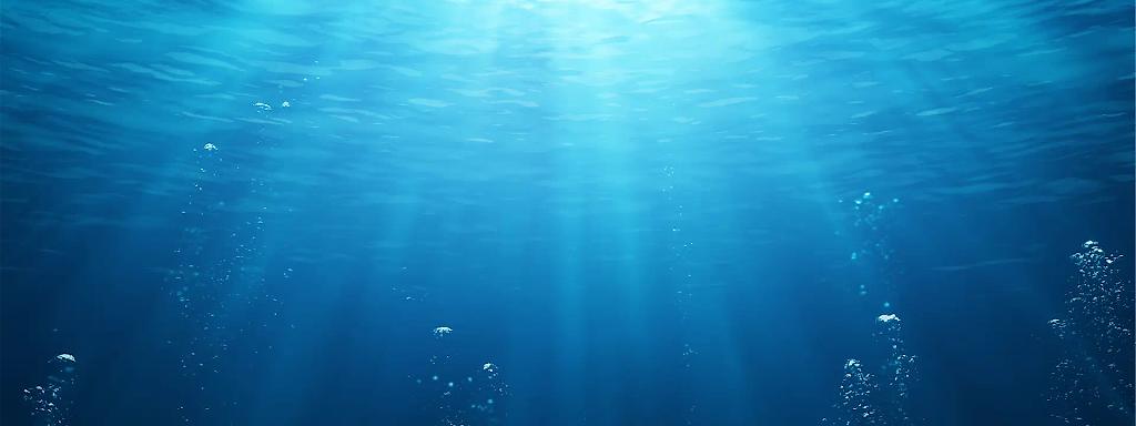 Blaues Meer mit aufsteigenden Luftblasen.